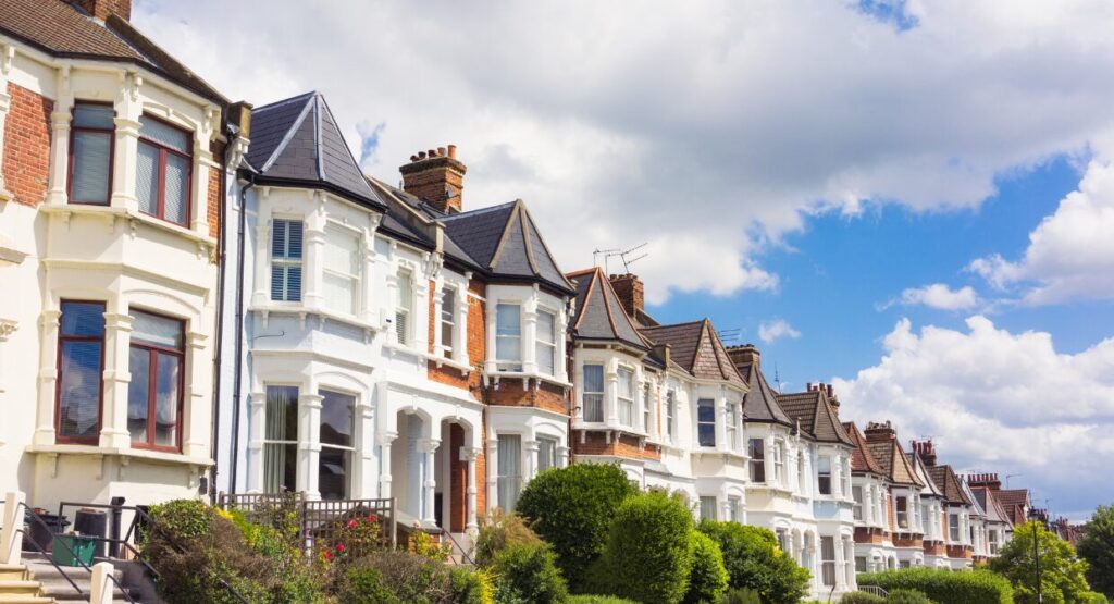 A row of well-maintained terraced houses on a bright day, symbolising high-quality rental homes for Country Properties landlords aiming to attract top tenants in 2025.