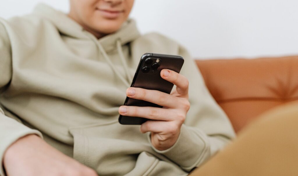 Homeowner checking an instant property valuation on their phone