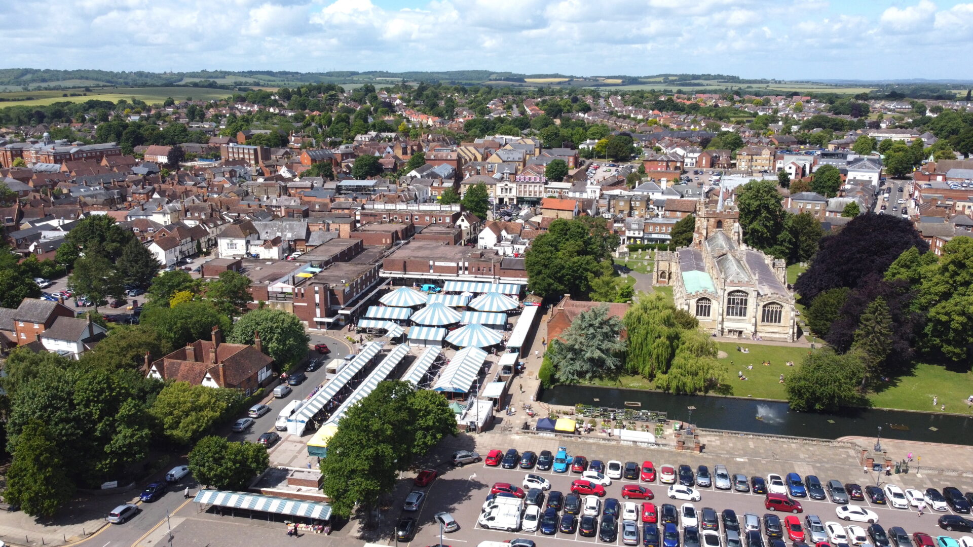 Aerial view of Hitchin town centre and residential areas near the railway station