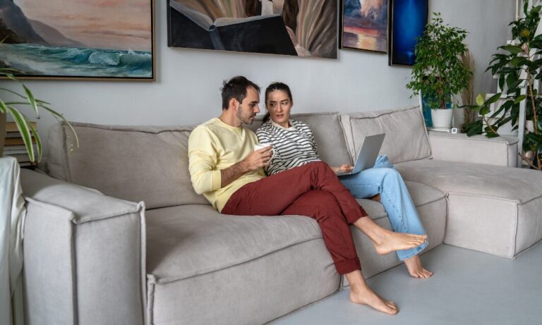 Couple reviewing rural property options and relocation plans