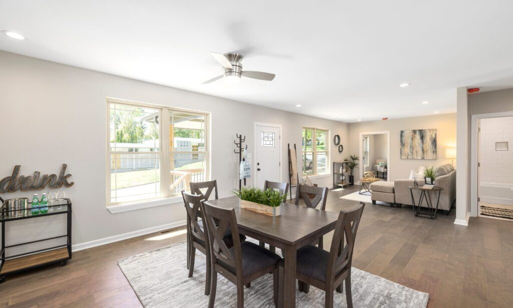 Bright open-plan dining and living room representing Hitchin property values and local housing market planning.