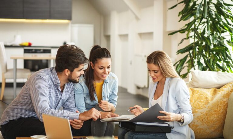 Buyers discussing countryside property costs and relocation plans