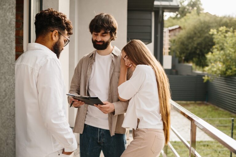 Couple viewing a home with an estate agent in Letchworth Garden City
